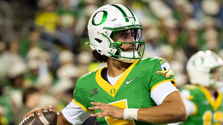 Oregon quarterback Dante Moore throws a pass before the game as the Oregon Ducks host the Minnesota Golden Gophers on Nov. 14, 2025, at Autzen Stadium in Eugene, Oregon.