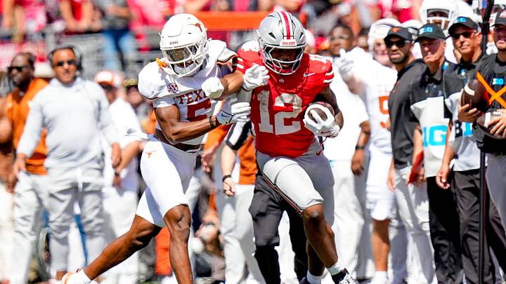Ohio State Buckeyes running back CJ Donaldson runs the ball against Texas Longhorns defensive back Malik Muhammad in the second half at Ohio Stadium on Saturday, Aug. 30, 2025, in Columbus, Ohio. Ohio State Buckeyes running back CJ Donaldson runs the ball against Texas Longhorns defensive back Malik Muhammad in the second half at Ohio Stadium on Saturday, Aug. 30, 2025, in Columbus, Ohio.