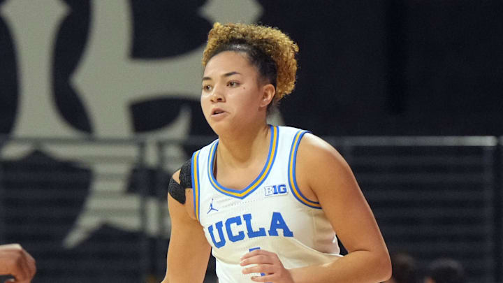 Jan 15, 2025; Long Beach, California, USA; UCLA Bruins guard Kiki Rice (1) dribbles against the Penn State Nittany Lions in the second half at the Walter Pyramid at Long Beach State. Mandatory Credit: Kirby Lee-Imagn Images