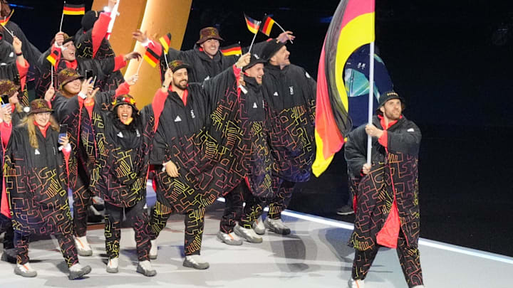 Feb 6, 2026; Milan, ITALY; Athletes from Germany are led by flag bearer Leon Draisaitl during the Opening Ceremony for the Milano Cortina 2026 Olympic Winter Games at Milano San Siro Olympic Stadium. Mandatory Credit: Amber Searls-Imagn Images