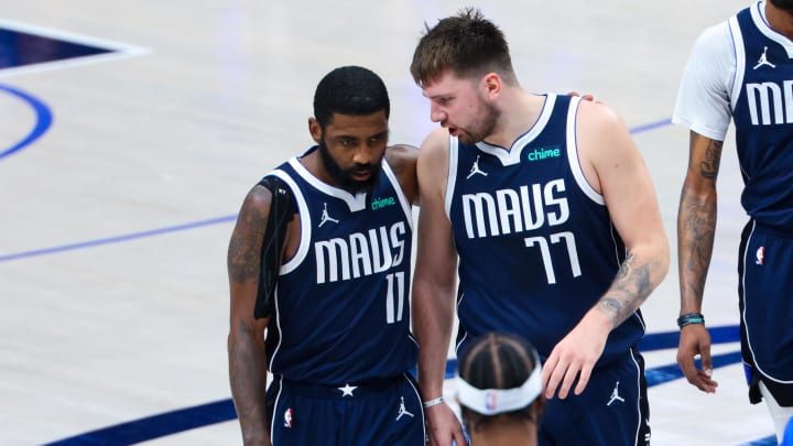 Jun 14, 2024; Dallas, Texas, USA; Dallas Mavericks guard Kyrie Irving (11) reacts with Dallas Mavericks guard Luka Doncic (77) during the second half against the Boston Celtics during game four of the 2024 NBA Finals at American Airlines Center. Mandatory Credit: Kevin Jairaj-USA TODAY Sports