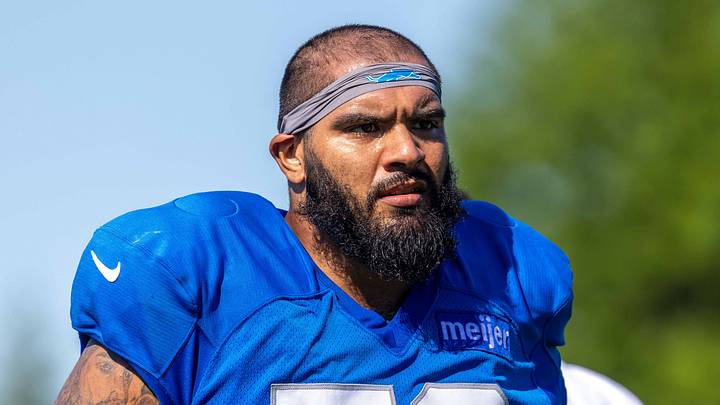 Aug 3, 2026; Allen Park, MI, USA; Detroit Lions offensive lineman Juice Scruggs (70) walks off the field following Detroit Lions training camp. Mandatory Credit: Paul Barnick-Imagn Images