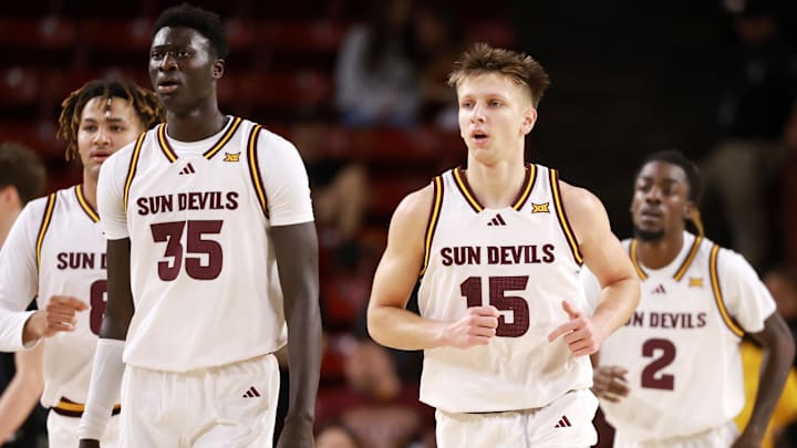 Jan 3, 2026; Tempe, Arizona, USA; Arizona State Sun Devils center Massamba Diop (35) and guard Noah Meeusen (15) against the Colorado Buffaloes at Desert Financial Arena. Mandatory Credit: Mark J. Rebilas-Imagn Images