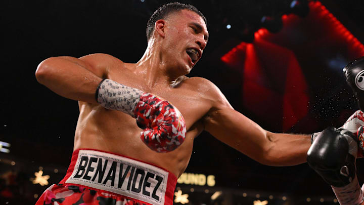 David Benavidez lands a left hook through the guard of David Morrell.