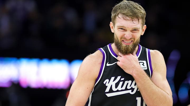 Dec 16, 2024; Sacramento, California, USA; Sacramento Kings forward Domantas Sabonis (11) reacts after a play during the fourth quarter against the Denver Nuggets at Golden 1 Center. Mandatory Credit: Sergio Estrada-Imagn Images