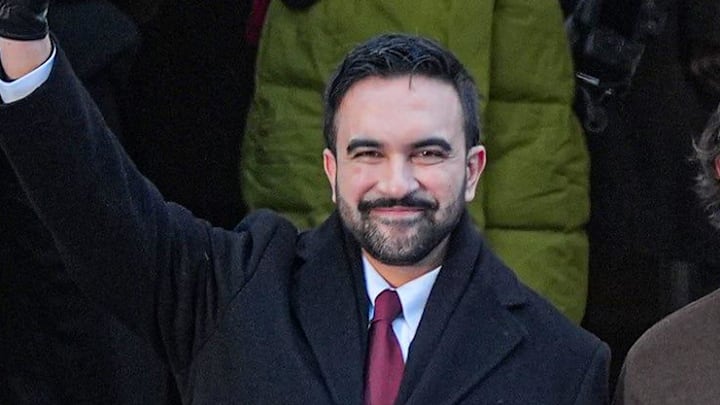 New York City Mayor Zohran Mamdani and his wife Rama Diwali walk out of city hall at the start of his public inauguration on Jan. 1, 2026.