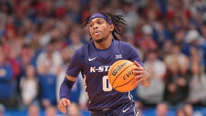 Kansas State Wildcats guard Dug McDaniel (0) dribbles down court against the Kansas Jayhawks in the second half of the Sunflower Showdown game inside Allen Fieldhouse Saturday, Jan. 18, 2025. Kansas State Wildcats guard Dug McDaniel (0) dribbles down court against the Kansas Jayhawks in the second half of the Sunflower Showdown game inside Allen Fieldhouse Saturday, Jan. 18, 2025.