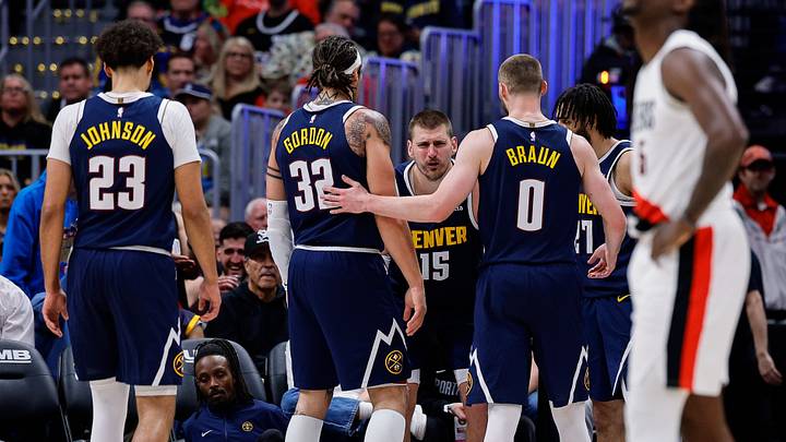 Apr 6, 2026; Denver, Colorado, USA; Denver Nuggets center Nikola Jokic (15) reacts after a play as forward Cam Johnson (23) and forward Aaron Gordon (32) and guard Christian Braun (0) and guard Jamal Murray (27) look on in the fourth quarter against the Portland Trail Blazers at Ball Arena. Mandatory Credit: Isaiah J. Downing-Imagn Images Apr 6, 2026; Denver, Colorado, USA; Denver Nuggets center Nikola Jokic (15) reacts after a play as forward Cam Johnson (23) and forward Aaron Gordon (32) and guard Christian Braun (0) and guard Jamal Murray (27) look on in the fourth quarter against the Portland Trail Blazers at Ball Arena. Mandatory Credit: Isaiah J. Downing-Imagn Images