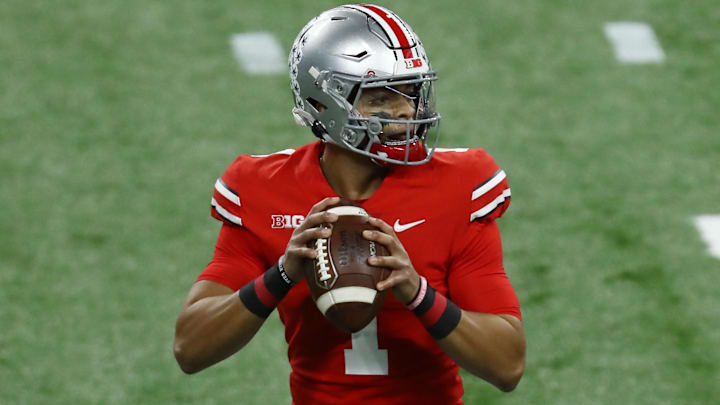 Dec 19, 2020; Indianapolis, Indiana, USA; Ohio State Buckeyes quarterback Justin Fields (1) drops back to pass against the Northwestern Wildcats during the first half at Lucas Oil Stadium. Mandatory Credit: Aaron Doster-Imagn Images Dec 19, 2020; Indianapolis, Indiana, USA; Ohio State Buckeyes quarterback Justin Fields (1) drops back to pass against the Northwestern Wildcats during the first half at Lucas Oil Stadium. Mandatory Credit: Aaron Doster-Imagn Images