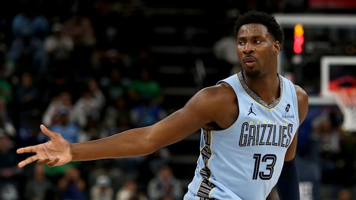Mar 31, 2025; Memphis, Tennessee, USA; Memphis Grizzlies forward Jaren Jackson Jr. (13) reacts after a three point basket during the third quarter against the Boston Celtics at FedExForum. Mandatory Credit: Petre Thomas-Imagn Images