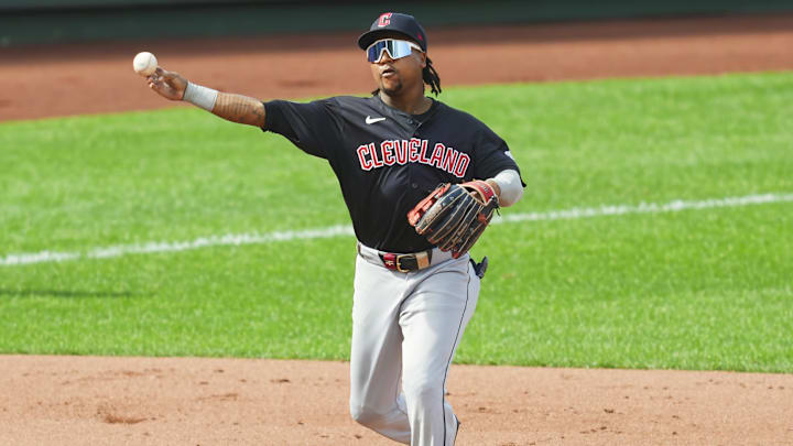 Sep 2, 2024; Kansas City, Missouri, USA; Cleveland Guardians third baseman Jose Ramirez (11) throws to first base during the fourth inning against the Kansas City Royals at Kauffman Stadium. Mandatory Credit: Jay Biggerstaff-Imagn Images