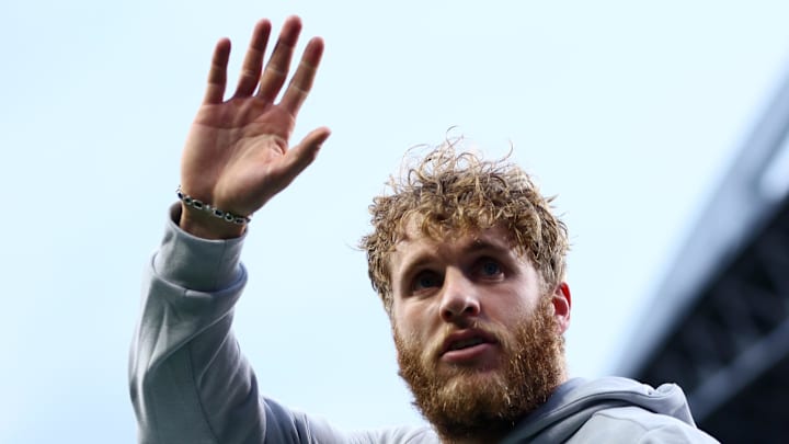 Dec 18, 2025; Seattle, Washington, USA; Seattle Seahawks wide receiver Cooper Kupp (10) waves to fans before the game against the Los Angeles Rams at Lumen Field. Mandatory Credit: Kevin Ng-Imagn Images