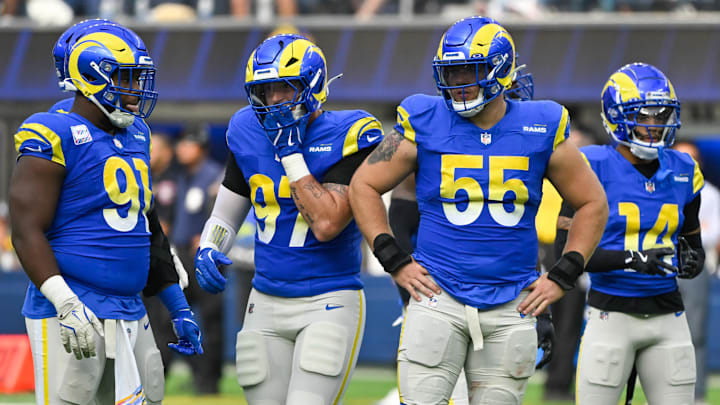 Oct 6, 2024; Inglewood, California, USA; Los Angeles Rams defensive tackle Kobie Turner (91),  linebacker Michael Hoecht (97), defensive tackle Braden Fiske (55) and cornerback Cobie Durant (14) during the second half against the Green Bay Packers at SoFi Stadium. Mandatory Credit: Robert Hanashiro-Imagn Images