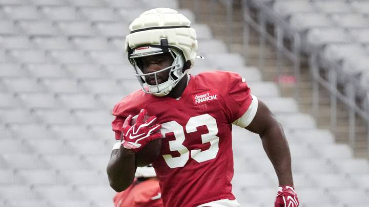 Arizona Cardinals running back Trey Benson (33) practices during training camp at State Farm Stadium in Glendale on July 26, 2026.