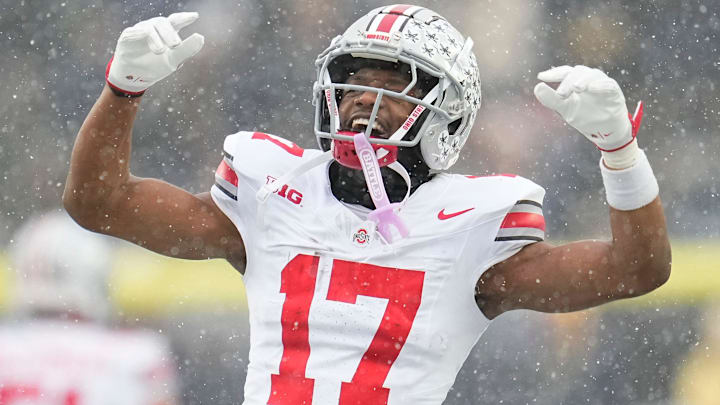 Ohio State Buckeyes wide receiver Carnell Tate celebrates during the NCAA football game against the Michigan Wolverines. Ohio State Buckeyes wide receiver Carnell Tate celebrates during the NCAA football game against the Michigan Wolverines.