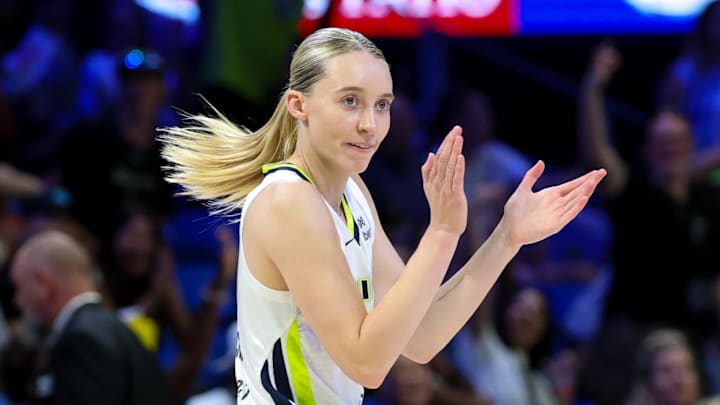 Jul 3, 2025; Arlington, Texas, USA;  Dallas Wings guard Paige Bueckers (5) reacts against the Phoenix Mercury  during the first half at College Park Center. Mandatory Credit: Kevin Jairaj-Imagn Images