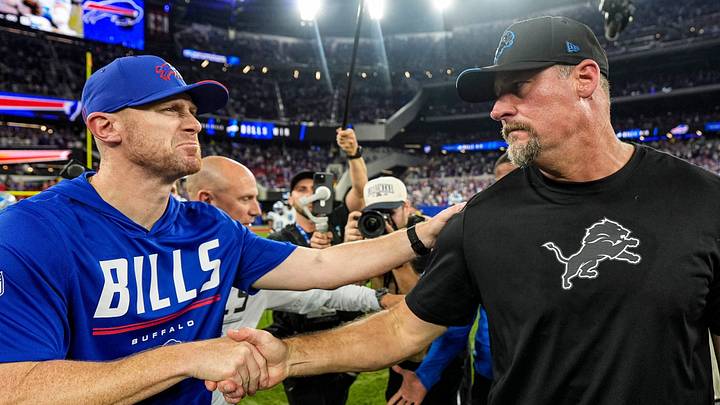 Detroit Lions head coach Dan Campbell, right, shakes hands with Buffalo Bills head coach Joe Brady Detroit Lions head coach Dan Campbell, right, shakes hands with Buffalo Bills head coach Joe Brady