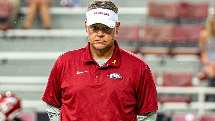 Arkansas Razorbacks offensive coordinator Tim Cramsey observes his unit during pregame warmups against Tulsa.
