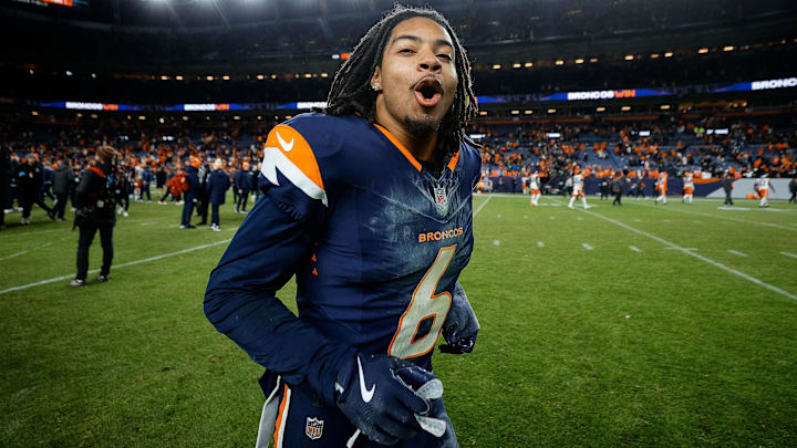 Dec 2, 2024; Denver, Colorado, USA; Denver Broncos safety P.J. Locke (6) celebrates after the game against the Cleveland Browns at Empower Field at Mile High. 