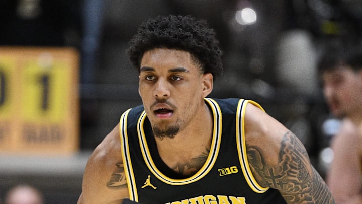 Feb 17, 2026; West Lafayette, Indiana, USA; Michigan Wolverines forward Yaxel Lendeborg (23) defends against Purdue Boilermakers guard Braden Smith (3) during the first half at Mackey Arena. Mandatory Credit: Marc Lebryk-Imagn Images
