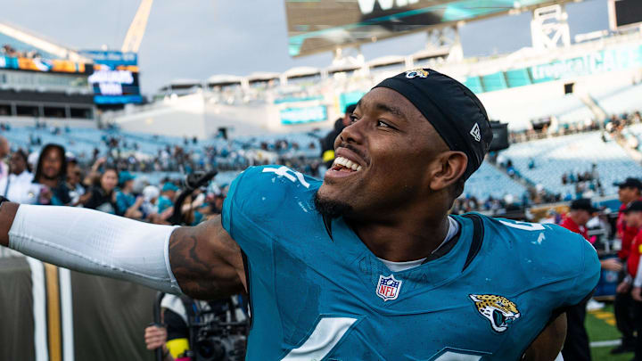 Jacksonville Jaguars defensive end Travon Walker (44) celebrates with fans at EverBank Stadium, Sunday, Dec. 14, 2025, in Jacksonville, Fla. The Jaguars defeated the Jets 48-20. Jacksonville Jaguars defensive end Travon Walker (44) celebrates with fans at EverBank Stadium, Sunday, Dec. 14, 2025, in Jacksonville, Fla. The Jaguars defeated the Jets 48-20.