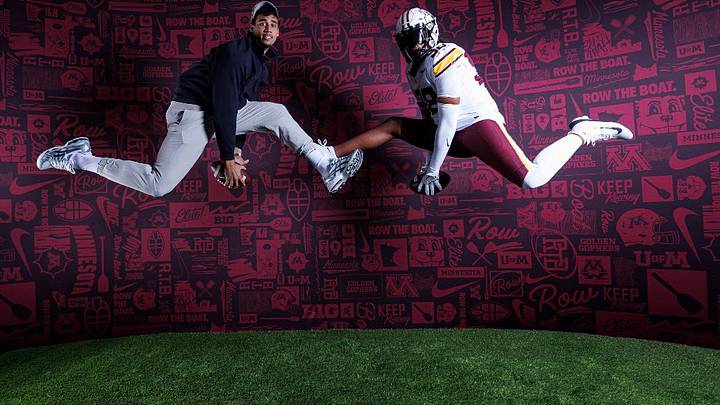 Cameron Saunders (right) with Gophers defensive end Adam Kissayi (left) during his official visit.