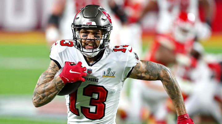 Feb 4, 2021; Tampa, FL, USA; Tampa Bay Buccaneers wide receiver Mike Evans (13) runs the ball during the second quarter against the Kansas City Chiefs in Super Bowl LV at Raymond James Stadium. Mandatory Credit: Mark J. Rebilas-Imagn Images Feb 4, 2021; Tampa, FL, USA; Tampa Bay Buccaneers wide receiver Mike Evans (13) runs the ball during the second quarter against the Kansas City Chiefs in Super Bowl LV at Raymond James Stadium. Mandatory Credit: Mark J. Rebilas-Imagn Images