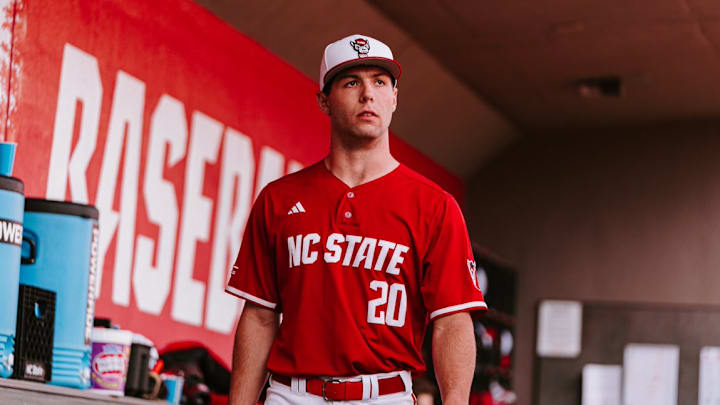NC State left-handed pitcher Ryan Marohn watches his team bat from the dugout in the Wolfpack's 4-2 win over Boston College on March 13, 2026. 