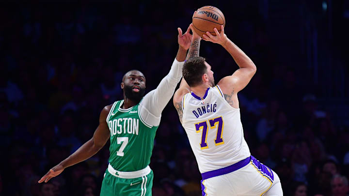 Feb 22, 2026; Los Angeles, California, USA; Los Angeles Lakers guard Luka Doncic (77) shoots against the defense of Boston Celtics guard Jaylen Brown (7) during the first half at Crypto.com Arena. Mandatory Credit: Gary A. Vasquez-Imagn Images Feb 22, 2026; Los Angeles, California, USA; Los Angeles Lakers guard Luka Doncic (77) shoots against the defense of Boston Celtics guard Jaylen Brown (7) during the first half at Crypto.com Arena. Mandatory Credit: Gary A. Vasquez-Imagn Images