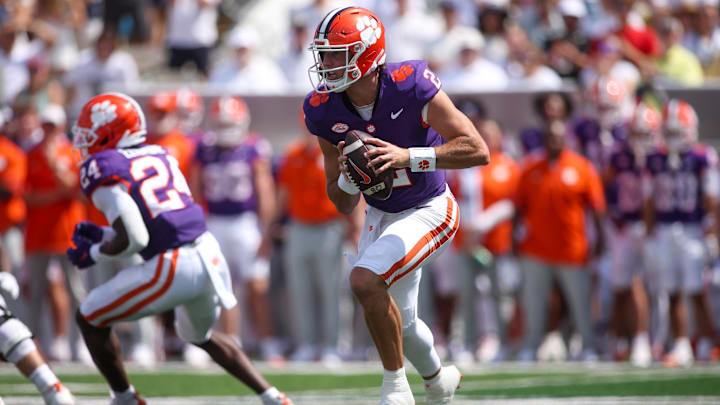 Sep 13, 2025; Atlanta, Georgia, USA; Clemson Tigers quarterback Cade Klubnik (2) scrambles against the Georgia Tech Yellow Jackets in the second quarter at Bobby Dodd Stadium at Hyundai Field. Mandatory Credit: Brett Davis-Imagn Images