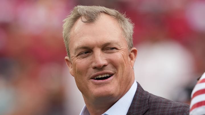 San Francisco 49ers general manager John Lynch (left)