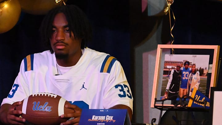 Oak Hills running back Karson Cox, who is heading to UCLA, poses for a photo on Tuesday, Dec. 3, 2024. Oak Hills hosted a signing event for five players that will be signing a National Letter of Intent during the three-day Early Signing Period.