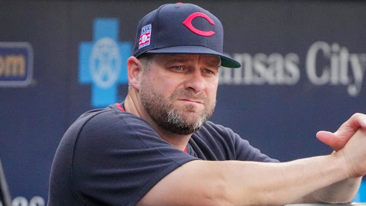 Jul 26, 2025; Kansas City, Missouri, USA; Cleveland Guardians manager Stephen Vogt (12) watches warm ups against the Kansas City Royals prior to a game at Kauffman Stadium. Mandatory Credit: Denny Medley-Imagn Images