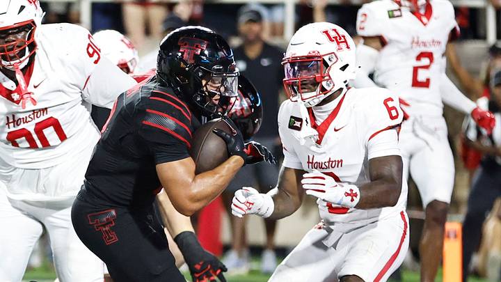 Texas Tech Red Raiders running back Cameron Dickey scores against Houston Cougars defensive safety. Mandatory Credit: Michael C. Johnson-Imagn Images Texas Tech Red Raiders running back Cameron Dickey scores against Houston Cougars defensive safety. Mandatory Credit: Michael C. Johnson-Imagn Images