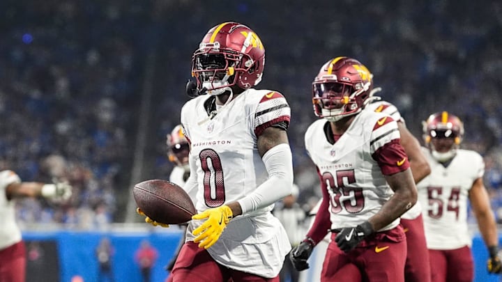 Washington Commanders cornerback Mike Sainristil (0) celebrates an interception against Detroit Lions during the first half of the NFC divisional round at Ford Field in Detroit on Saturday, Jan. 18, 2025. Washington Commanders cornerback Mike Sainristil (0) celebrates an interception against Detroit Lions during the first half of the NFC divisional round at Ford Field in Detroit on Saturday, Jan. 18, 2025.