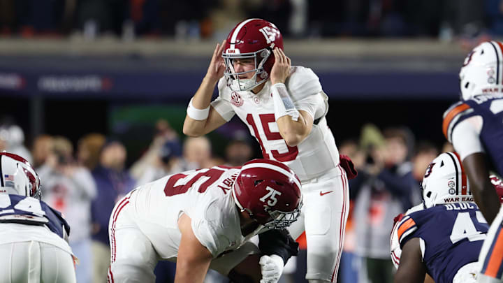 Nov 29, 2025; Auburn, Alabama, USA; Alabama Crimson Tide quarterback Ty Simpson (15) talks to teammates during the first half against the Auburn Tigers at Jordan-Hare Stadium. Mandatory Credit: John Reed-Imagn Images