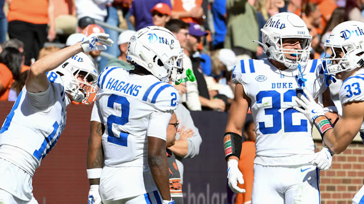 Duke Blue Devils wide receiver Sahmir Hagans (2) celebrates with teammates after returning a kickoff for a touchdown Saturday, Nov. 1, 2025, during the NCAA football game against the Clemson Tigers at Memorial Stadium in Clemson, South Carolina.