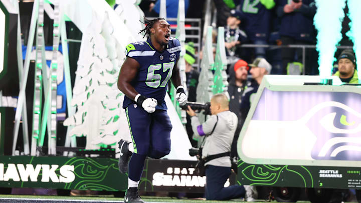 Jan 17, 2026; Seattle, WA, USA; Seattle Seahawks offensive tackle Charles Cross (67) takes the field prior to a game against the San Francisco 49ers in an NFC Divisional Round game at Lumen Field. Mandatory Credit: Kevin Ng-Imagn Images