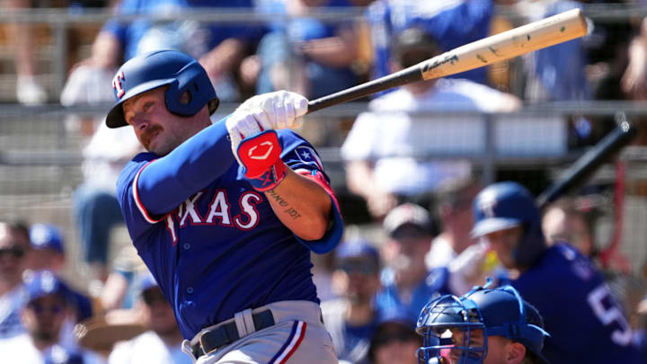 Mar 9, 2024; Phoenix, Arizona, USA; Texas Rangers first baseman Blaine Crim (74) bats against the Los Angeles Dodgers during the second inning at Camelback Ranch-Glendale. Mandatory Credit: Joe Camporeale-Imagn Images Mar 9, 2024; Phoenix, Arizona, USA; Texas Rangers first baseman Blaine Crim (74) bats against the Los Angeles Dodgers during the second inning at Camelback Ranch-Glendale. Mandatory Credit: Joe Camporeale-Imagn Images