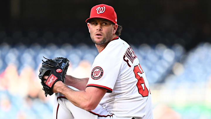 May 6, 2025; Washington, District of Columbia, USA; Washington Nationals relief pitcher Kyle Finnegan (67) delivers a pitch during the ninth inning against the Cleveland Guardians at Nationals Park. May 6, 2025; Washington, District of Columbia, USA; Washington Nationals relief pitcher Kyle Finnegan (67) delivers a pitch during the ninth inning against the Cleveland Guardians at Nationals Park.
