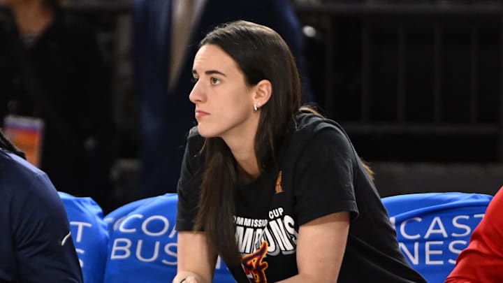 Sep 7, 2025; Baltimore, MD, USA; Indiana Fever guard Caitlin Clark (22) looks on from the bench against the Washington Mystics during the first quarter at CFG Bank Arena. Mandatory Credit: Rafael Suanes-Imagn Images