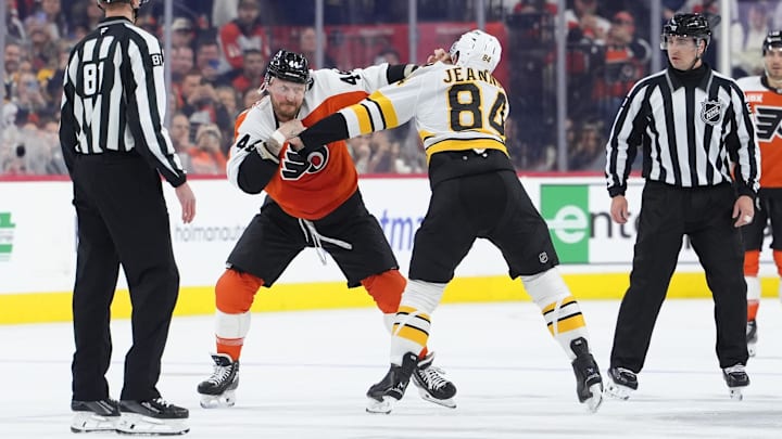 Feb 28, 2026; Philadelphia, Pennsylvania, USA; Philadelphia Flyers left wing Nicolas Deslauriers (44) fights Boston Bruins left wing Tanner Jeannot (84) in the first period at Xfinity Mobile Arena.