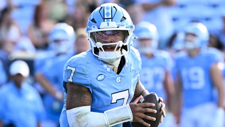 Sep 13, 2025; Chapel Hill, North Carolina, USA; North Carolina Tar Heels quarterback Gio Lopez (7) looks to pass in the third quarter at Kenan Stadium. Mandatory Credit: Bob Donnan-Imagn Images Sep 13, 2025; Chapel Hill, North Carolina, USA; North Carolina Tar Heels quarterback Gio Lopez (7) looks to pass in the third quarter at Kenan Stadium. Mandatory Credit: Bob Donnan-Imagn Images