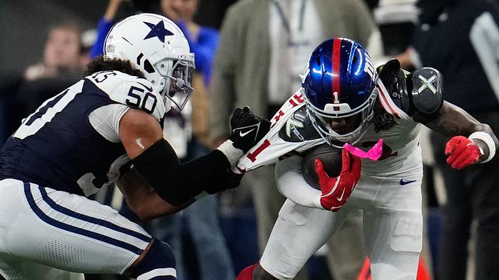 New York Giants wide receiver Malik Nabers catches a pass as Dallas Cowboys linebacker Eric Kendricks at AT&T Stadium New York Giants wide receiver Malik Nabers catches a pass as Dallas Cowboys linebacker Eric Kendricks at AT&T Stadium