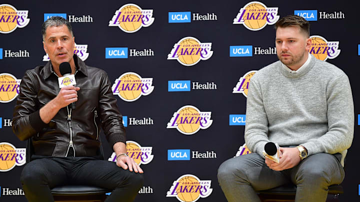 Feb 4, 2025; El Segundo, CA, USA; Los Angeles Lakers vice president of basketball operations and general manager Rob Pelinka introduces guard Luka Doncic at UCLA Health Training Center. Mandatory Credit: Gary A. Vasquez-Imagn Images Feb 4, 2025; El Segundo, CA, USA; Los Angeles Lakers vice president of basketball operations and general manager Rob Pelinka introduces guard Luka Doncic at UCLA Health Training Center. Mandatory Credit: Gary A. Vasquez-Imagn Images