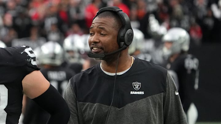 Jan 7, 2023; Paradise, Nevada, USA; Las Vegas Raiders defensive end Maxx Crosby (98) and defensive coordinator Patrick Graham talk during their game against the Kansas City Chiefs in the first half at Allegiant Stadium. Mandatory Credit: Kirby Lee-Imagn Images