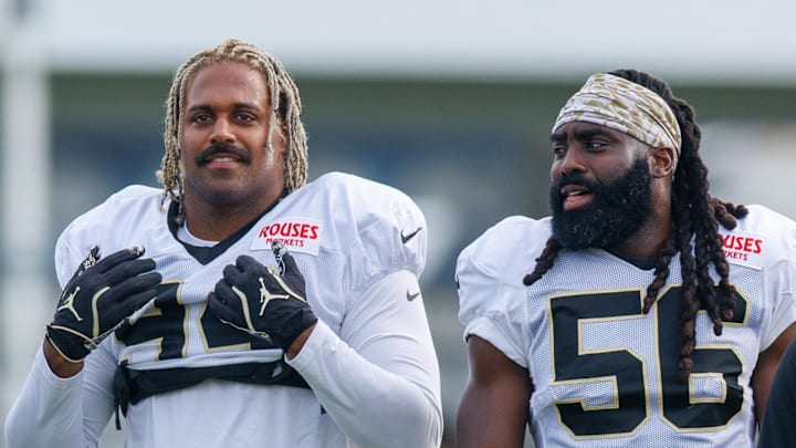 Jul 30, 2025; New Orleans, LA, USA;  New Orleans Saints defensive end Cameron Jordan (94) and linebacker Demario Davis (56).
