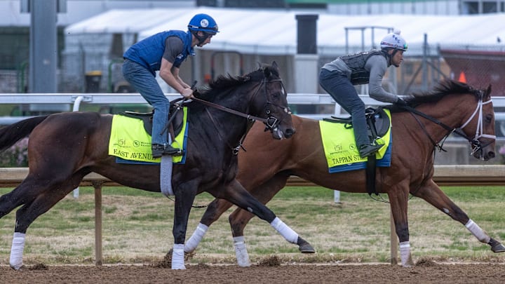 Kentucky Derby hopefuls East Avenue and Tappan Street circle the track at Churchill Downs during morning workouts. Photo by Pat McDonogh. April 23, 2025