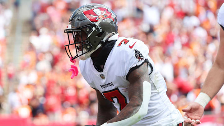 Sep 22, 2024; Tampa, Florida, USA; Tampa Bay Buccaneers running back Bucky Irving (7) celebrates during the first half against the Denver Broncos at Raymond James Stadium. Mandatory Credit: Kim Klement Neitzel-Imagn Images