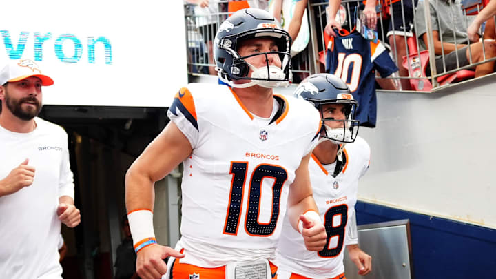 Aug 18, 2024; Denver, Colorado, USA; Denver Broncos quarterback Bo Nix (10) and quarterback Jarrett Stidham (8) before the preseason game against the Green Bay Packers at Empower Field at Mile High.